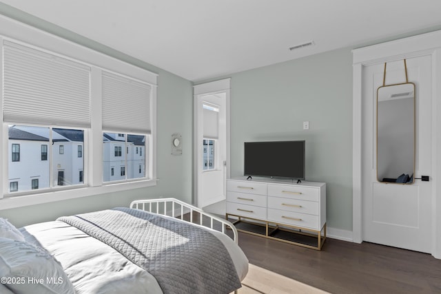 bedroom featuring wood-type flooring