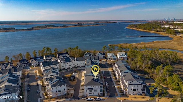 aerial view with a residential view and a water view