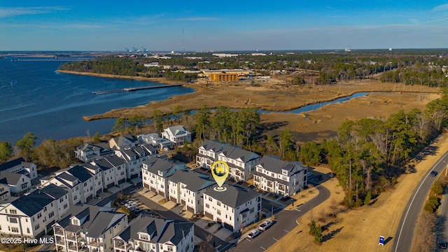 aerial view with a residential view and a water view