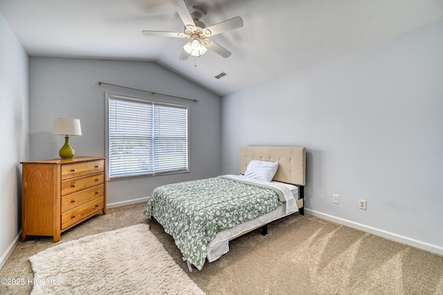 bedroom with vaulted ceiling, carpet floors, and ceiling fan