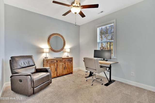 carpeted office with ceiling fan