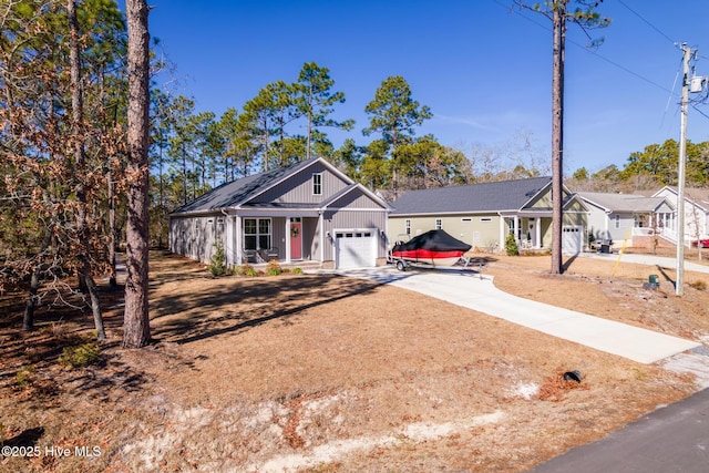 view of front of house featuring a garage and covered porch