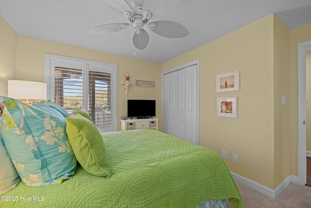 bedroom featuring carpet floors, a closet, and ceiling fan