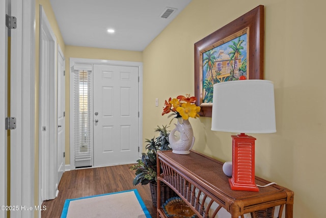 entrance foyer featuring dark hardwood / wood-style floors