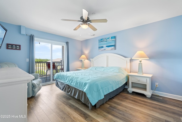 bedroom with access to exterior, dark wood-type flooring, and ceiling fan