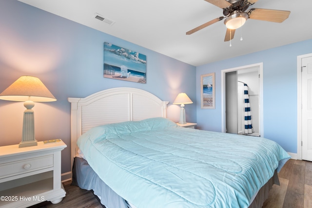 bedroom featuring dark wood-type flooring and ceiling fan