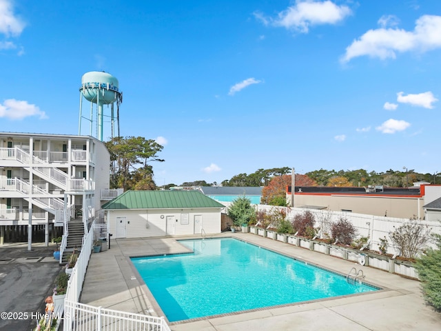 view of swimming pool featuring a patio area