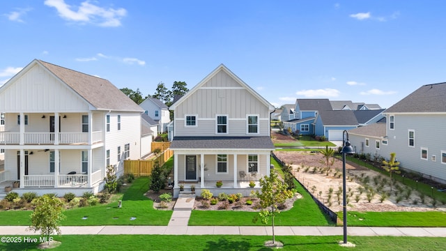 view of front of home featuring a front yard and covered porch