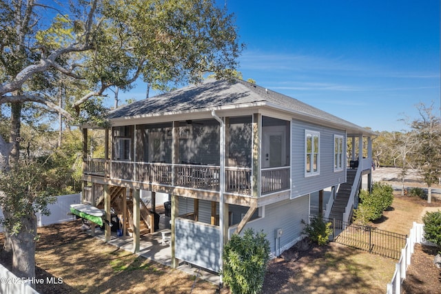 exterior space featuring a sunroom