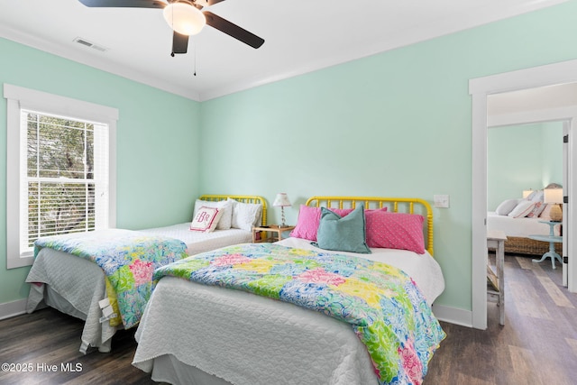 bedroom featuring dark wood-type flooring and ceiling fan