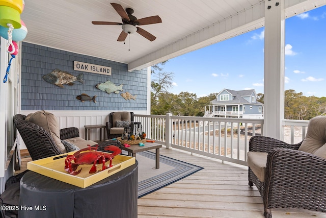 wooden terrace with ceiling fan