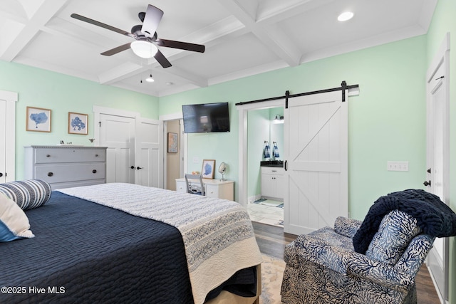 bedroom with a barn door, coffered ceiling, beam ceiling, and light hardwood / wood-style flooring