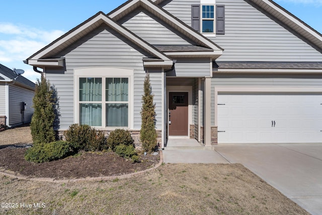 view of front of home with a garage