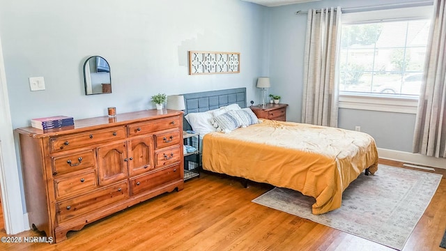 bedroom featuring light wood-type flooring