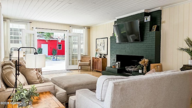 tiled living room featuring ornamental molding, wood ceiling, and a fireplace