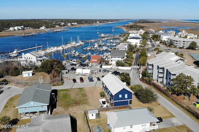 drone / aerial view with a water view