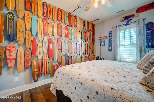 bedroom featuring dark hardwood / wood-style floors and ceiling fan