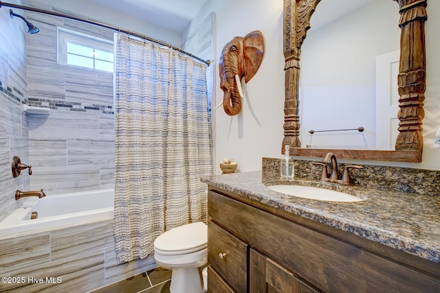 full bathroom with vanity, toilet, and shower / bath combo with shower curtain