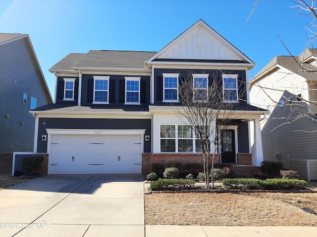 craftsman house with driveway, central AC unit, board and batten siding, and brick siding