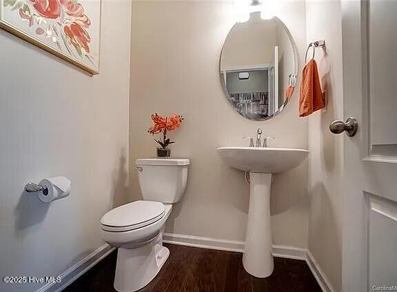 bathroom featuring a stall shower and a bath