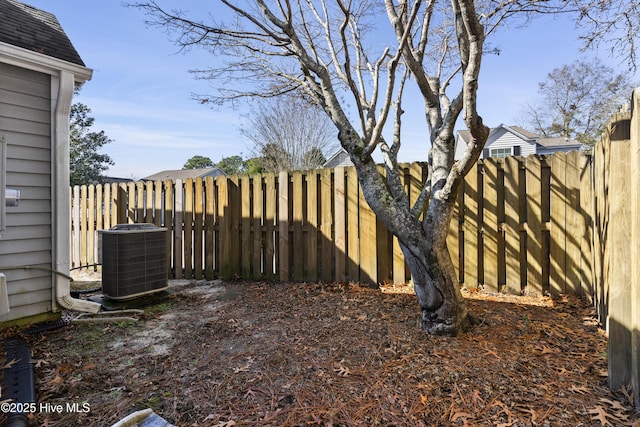 view of yard featuring central AC