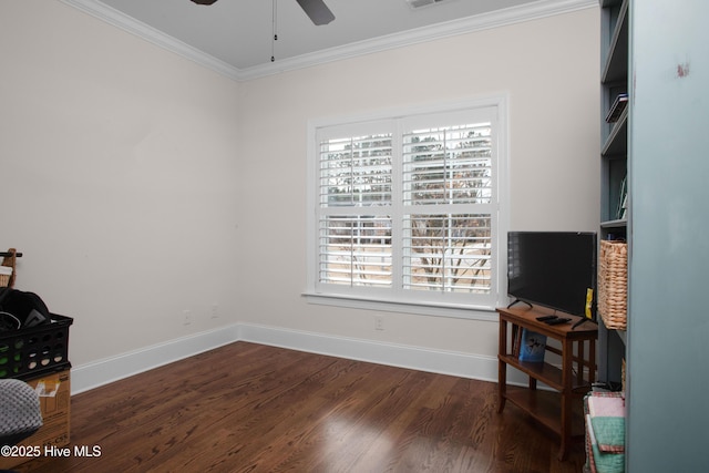 sitting room with visible vents, crown molding, baseboards, ceiling fan, and dark wood-style flooring