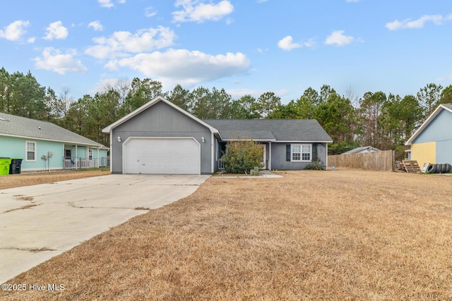 single story home featuring a garage and a front yard