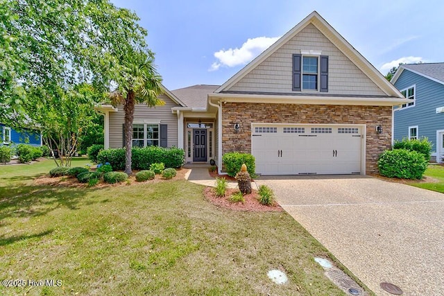 2173 Palm Pointe NE, Leland, NC 28451 - view of front of house with a front yard, a garage, concrete driveway, and stone siding
