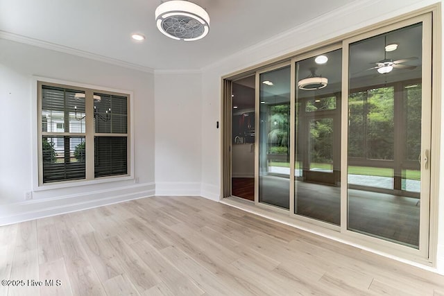 2173 Palm Pointe NE, Leland, NC 28451 - unfurnished room featuring crown molding, baseboards, wood finished floors, and recessed lighting