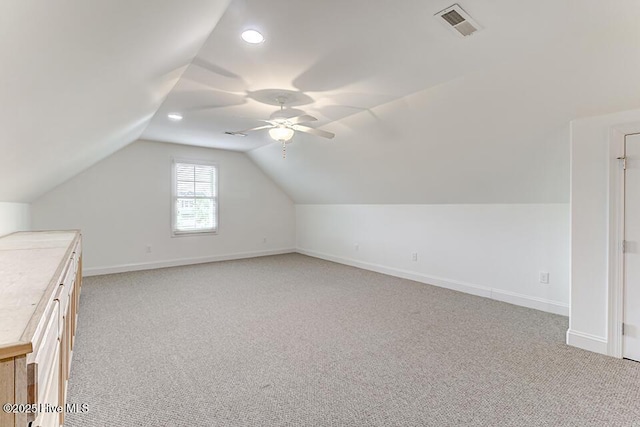 2173 Palm Pointe NE, Leland, NC 28451 - bonus room with light carpet, vaulted ceiling, ceiling fan, baseboards, and recessed lighting