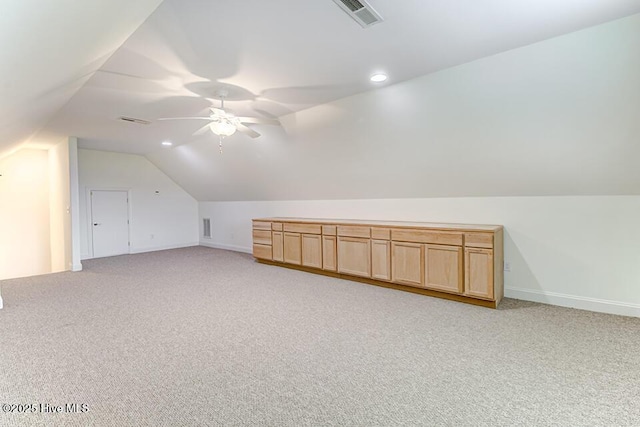 2173 Palm Pointe NE, Leland, NC 28451 - bonus room with lofted ceiling, light carpet, a ceiling fan, and baseboards