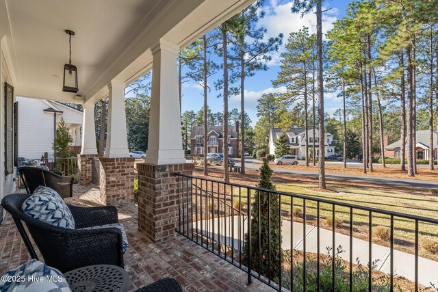 property entrance with covered porch