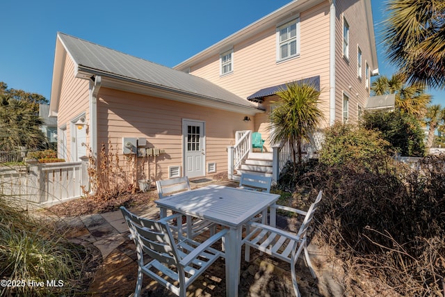 back of house featuring a patio area