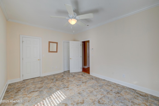 empty room with crown molding and ceiling fan