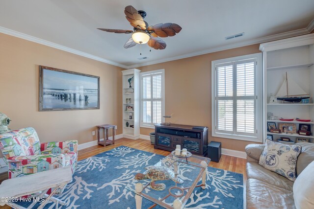 unfurnished room featuring ornamental molding and ceiling fan