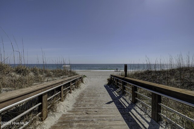 view of water feature with a beach view