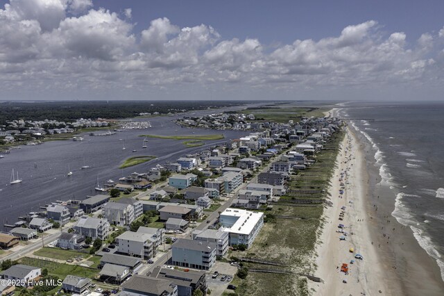 aerial view featuring a view of the beach and a water view