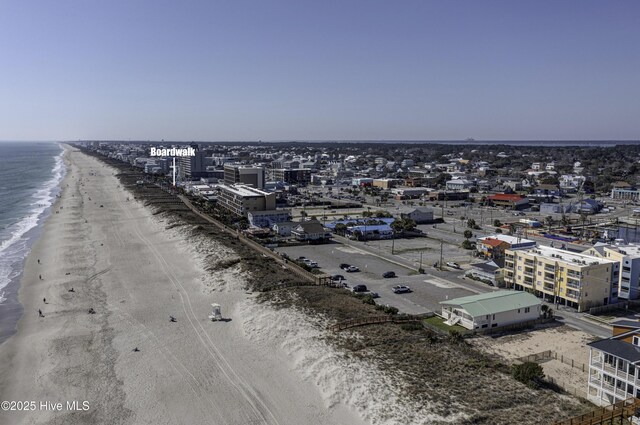 bird's eye view with a view of the beach and a water view