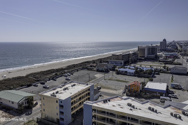 aerial view with a view of the beach and a water view