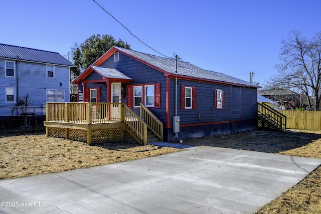 view of front of home with a deck