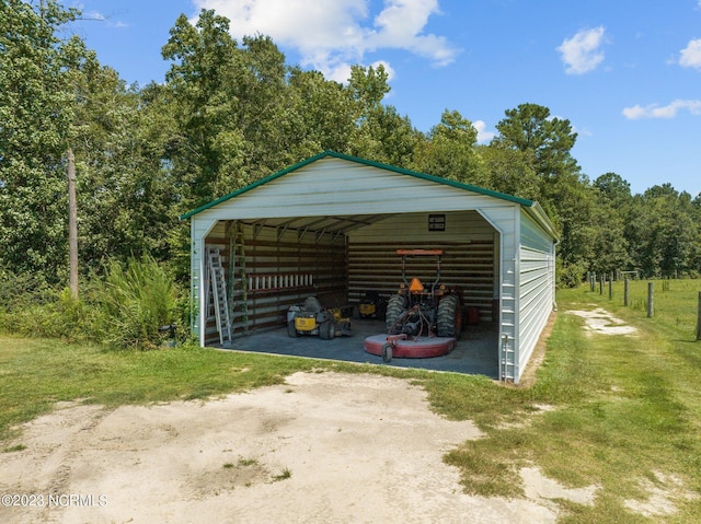 view of parking / parking lot featuring a yard