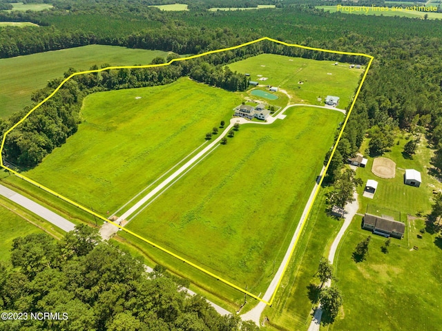 birds eye view of property featuring a rural view