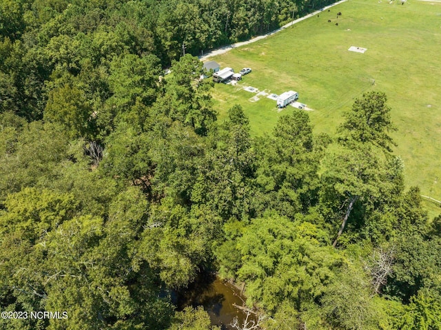 birds eye view of property with a rural view