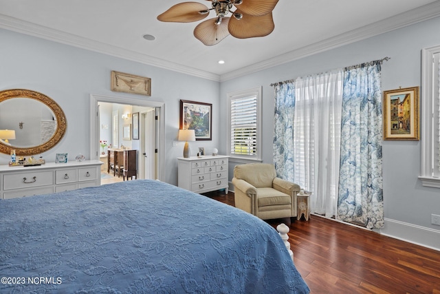 bedroom with ornamental molding, dark wood-type flooring, and ceiling fan