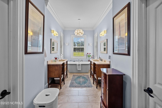 bathroom featuring vanity, tile patterned flooring, a bathtub, and crown molding