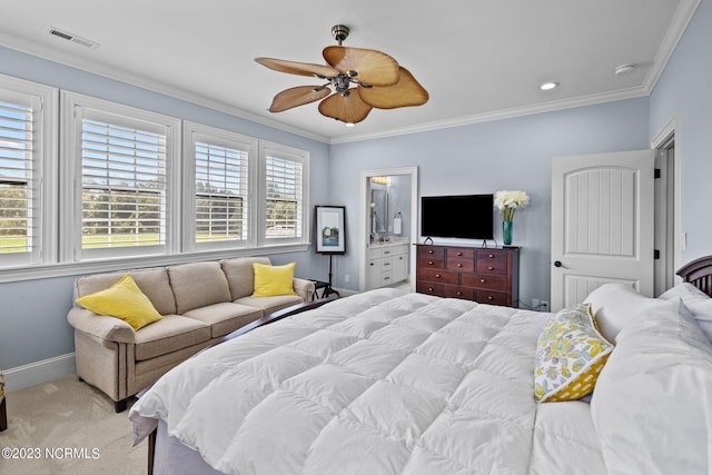 bedroom with crown molding, ceiling fan, connected bathroom, and light carpet