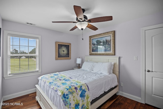 bedroom featuring dark hardwood / wood-style floors and ceiling fan