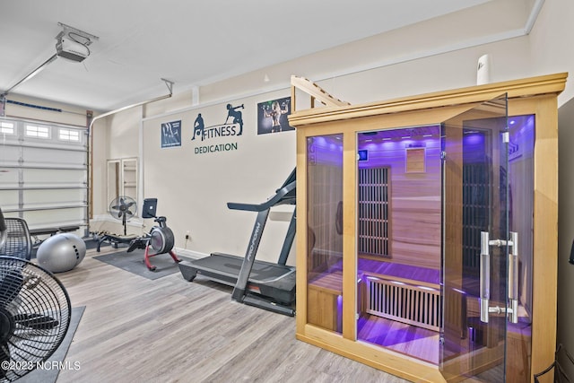 exercise area featuring hardwood / wood-style floors