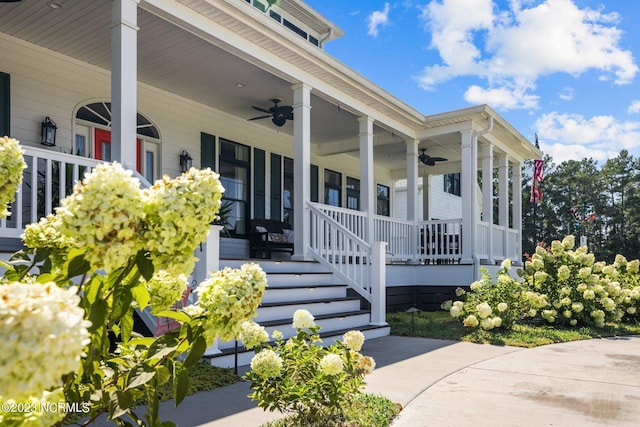 doorway to property featuring ceiling fan and covered porch