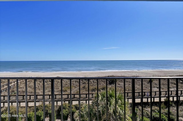 property view of water featuring a beach view